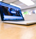 defocused-blur-of-laptop-on-wood-table-office-te-2026-01-11-08-11-45-utc